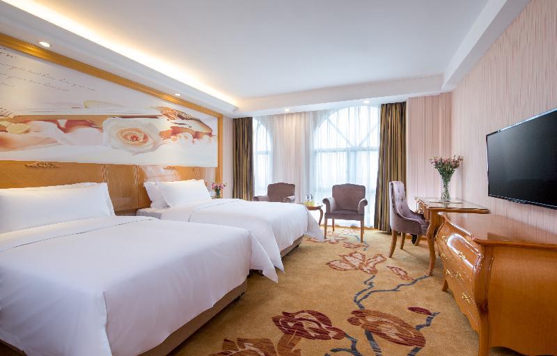 Vienna International Hotel Luogang Wanda Plaza Guangzhou Buitenkant foto